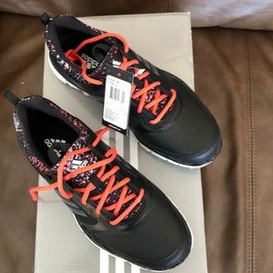 W Adidas sport golf shoes.